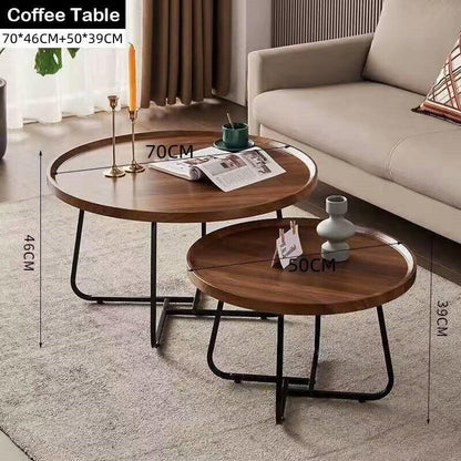 Two wooden coffee tables with dimensions displayed in a living room setting.